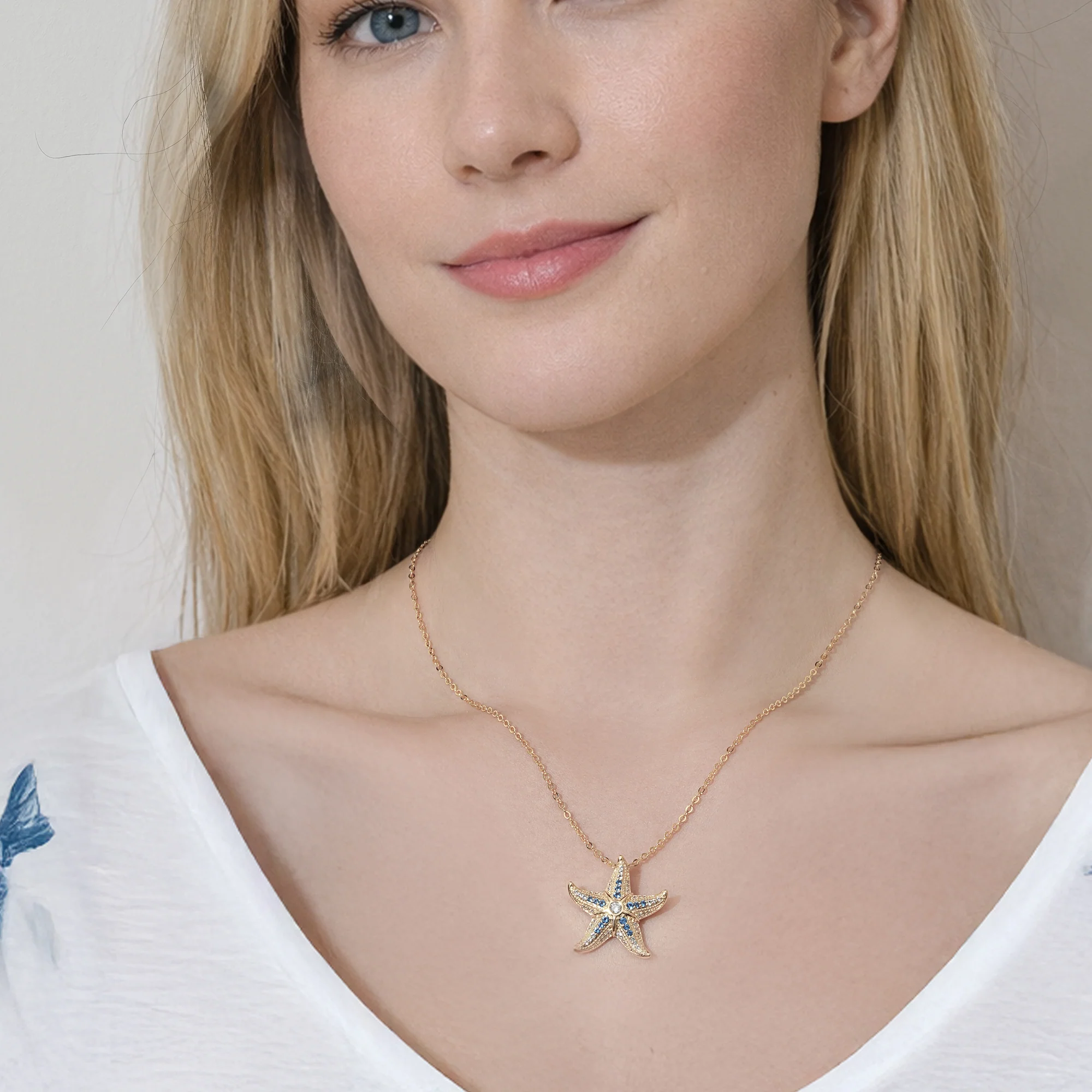 At the time, Svenja Royal starfish pendant with deep blue zirconia and white accents